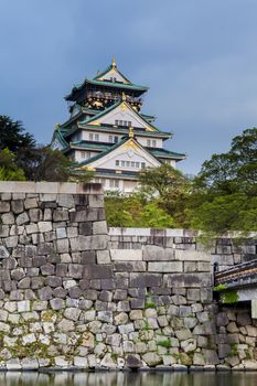 Sunset view of the main tower of Osaka Castle, Japan.