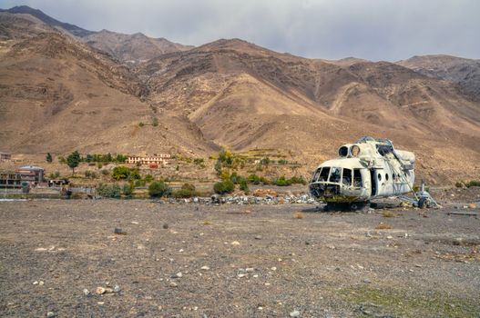 Plane wreck lying on the barren land in Afghanistan