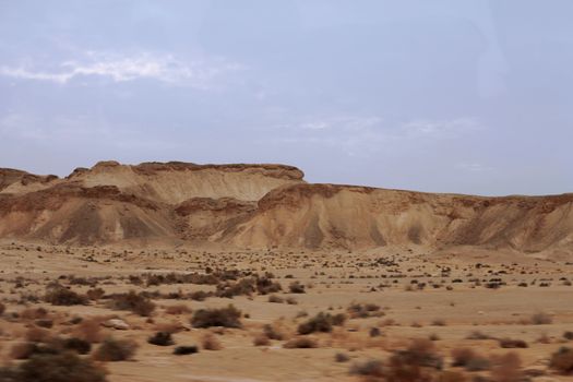 An Egyptian Desert And Mysty Sky in the daylight