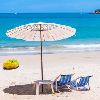 Beach chair and Umbrella on the beach at Samed Island,Thailand