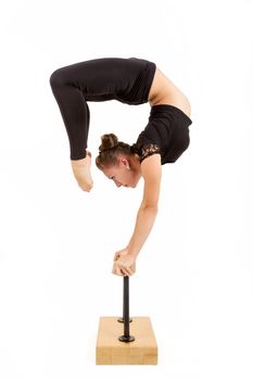 beauty contortionist practicing gymnastic yoga isolated on white background, Young professional gymnast woman