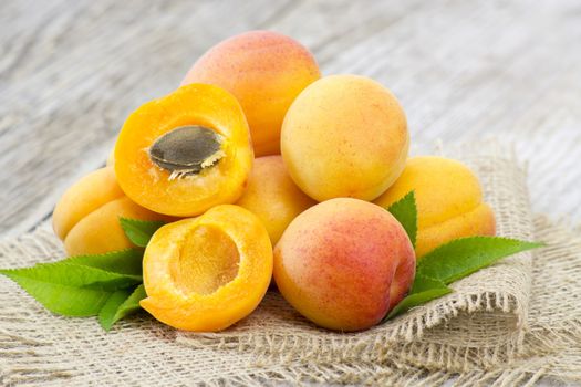 fresh apricots on wooden background