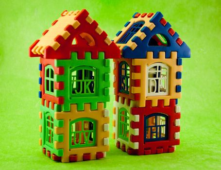 toys like a house on a green background