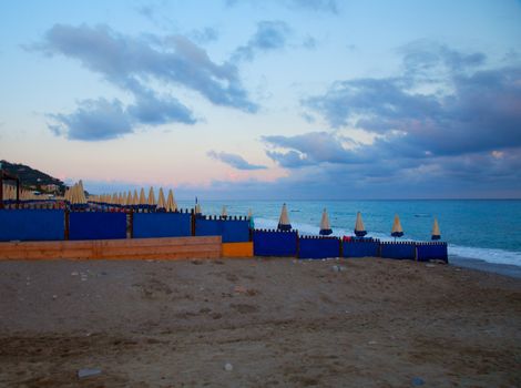 Beach and sea under wonderful sunset lights