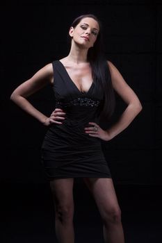 woman in a short black dress