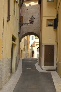 Narrow street in the city of Verona, Italy