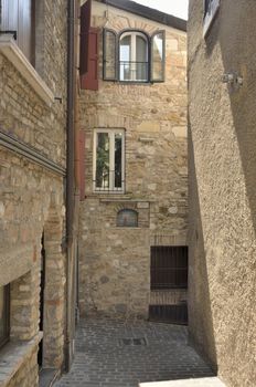 Medieval alley in Sirmione on lake Grada, Italy. 