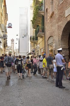 Tourists going into the house of Juliet, Verona, Italy