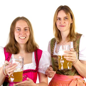 Women in dirndl presenting double beer