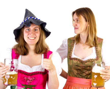 Girl in dirndl wearing Seppelhut showing thumb up