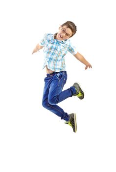 little boy jumping on isolated white background