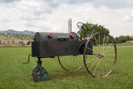 This funky old tractor sits in a field with other Old West Nostalgia objects in Masonville, CO.