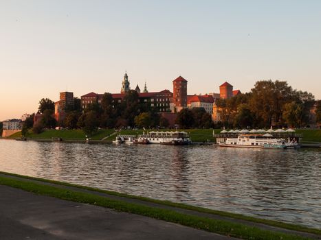 Evening at Vistula River and Wawel Castle in Krakow (Poland)