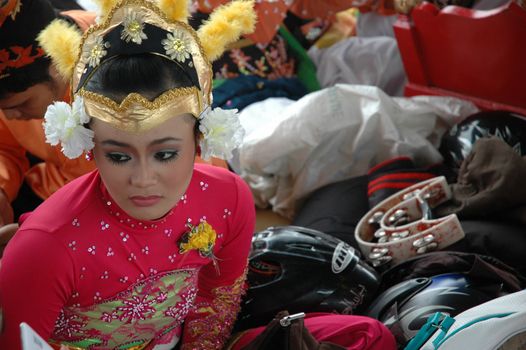 Bandung, Indonesia - March 9, 2008: Dancer member that gather together and make preparation before get performing on stage at Tegalega Park Bandung, West Java-Indonesia.