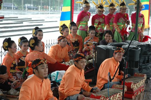 Bandung, Indonesia - March 9, 2008: Dancer member and musical crew gather together and make preparation before get performing on stage at Tegalega Park Bandung, West Java-Indonesia.