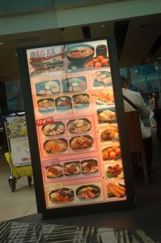 Singapore, Singapore - January 16, 2014: Restaurant menu banner that displayed on one of restaurant in Terminal 3 Changi International Airport, Singapore.