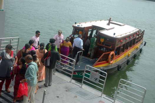 Singapore, Singapore - January 18, 2014: Tourist boat at Merlion Park harbour Singapore.