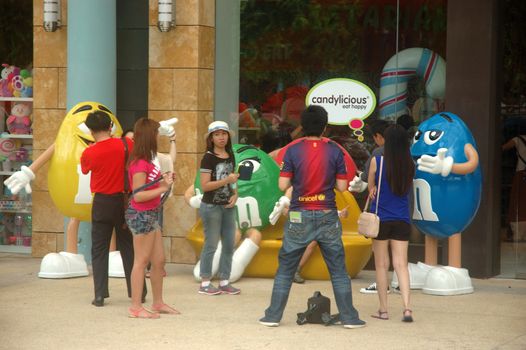 Sentosa island, Singapore - January 18, 2014: People crowd at Universal Studio Singapore.