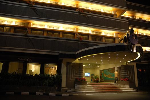 Bandung, Indonesia - October 3, 2007: Savoy Homann Hotel building exterior taken at night time.