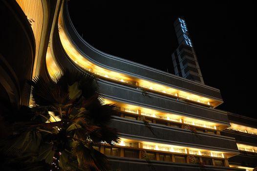 Bandung, Indonesia - October 3, 2007: Savoy Homann Hotel building exterior taken at night time.