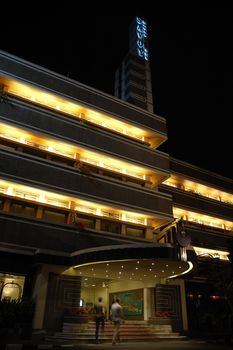 Bandung, Indonesia - October 3, 2007: Savoy Homann Hotel building exterior taken at night time.