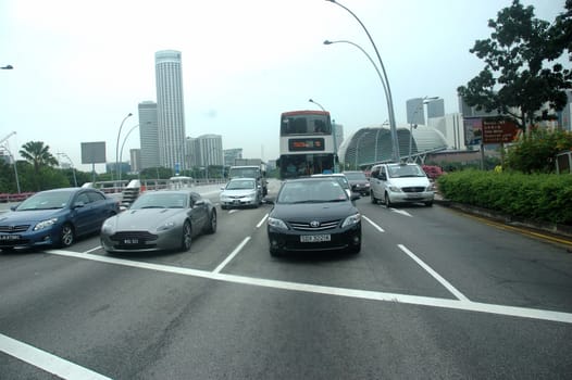 Singapore, Singapore - April 14, 2013: Road traffic at Singapore.