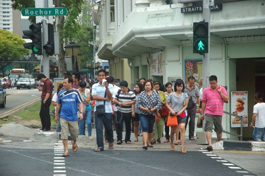 Singapore, Singapore - April 14, 2013: People crowd at Rochor road, Singapore.