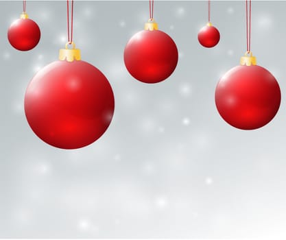 hanging christmas red balls in front of grey background with snowflakes