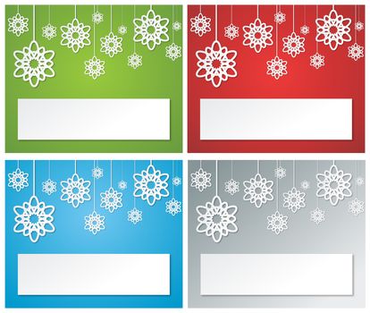 four christmas banners composed from hanging paper snowflakes