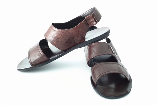 brown sandals on a white background