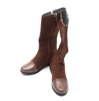 brown female boots on a white background