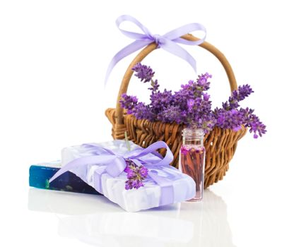 Natural handmade lavender soap and oil with fresh lavender on white background