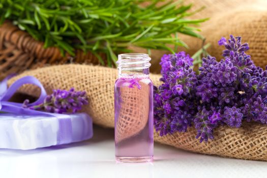 Natural handmade lavender Liquid soap and solid soap with fresh lavender flowers, on sackcloth