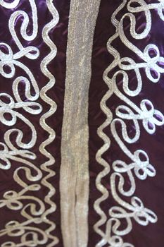 fabric pattern on the violet Moroccan suit