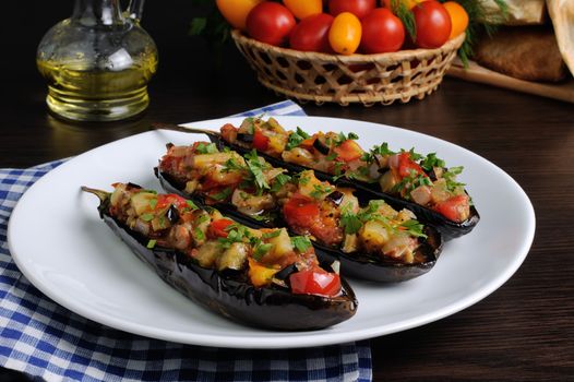 Appetizer of fried eggplant with tomatoes, parsley
