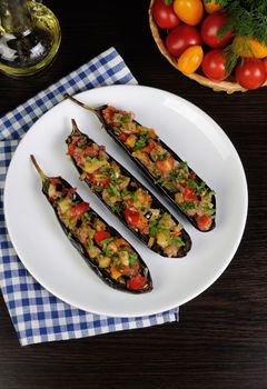 Appetizer of fried eggplant with tomatoes, parsley