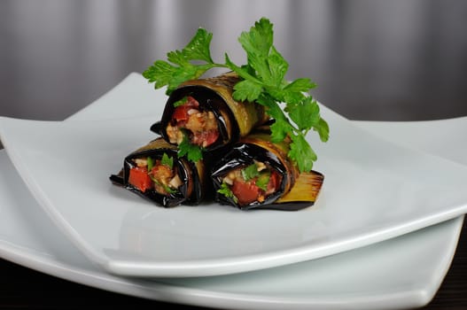 Rolls of fried eggplant stuffed with vegetables