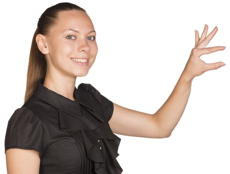 Young beautiful woman holding small imaginary object with two fingers. Isolated on white