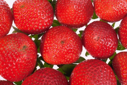 group of red strawberries isolated on white background