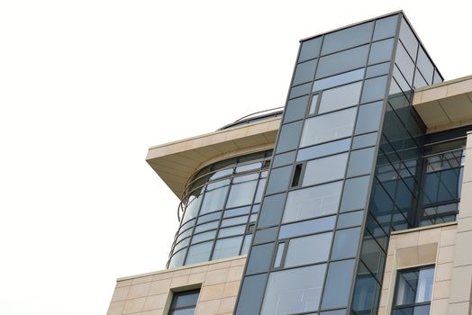 Tip stylish new building. Snapshot from bottom up. Glass facade