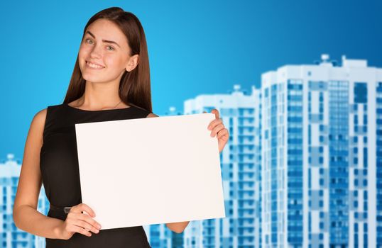 Businesswoman hold paper sheet. New houses row as backdrop