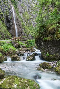 walking through the gorges of Sottoguda in a summer day, Dolomites