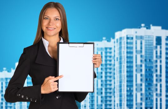 Businesswoman holding paper holder. New houses row as backdrop