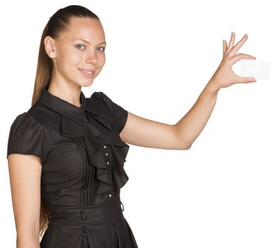 Young beautiful woman holding small imaginary object with two fingers. Isolated on white