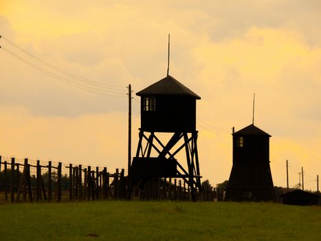 Evening view od tower silhouettes of concentration camp in Majdanek (Poland)