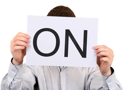 Person shows Paper with slogan ON on the White Background