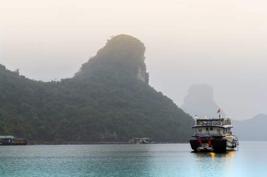 Ship in Morning Haze.  Ha Long Bay, Vietnam.