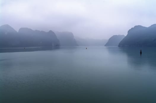 In Morning Mist.  Ha Long Bay, Vietnam.