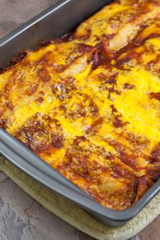 Homemade beef, been, and cheese enchiladas.