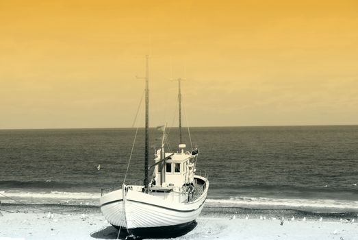 Fishing boat on the beach in Denmark